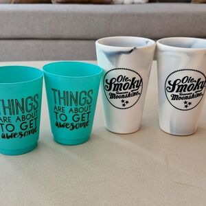 Two Sets Of Picnic Cups